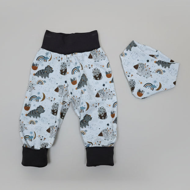 Babykleider aus Baumwolljersey mit Dinosauriermuster in weiss und braun, handgefertigt in der Schweiz, swiss made