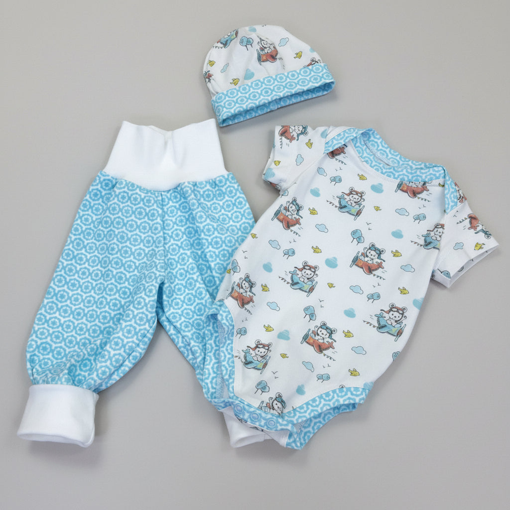 Babykleiderset aus Baumwolljersey mit Flugzeugmotiv in weiss und türkis, handgefertigt in der Schweiz, Swiss made