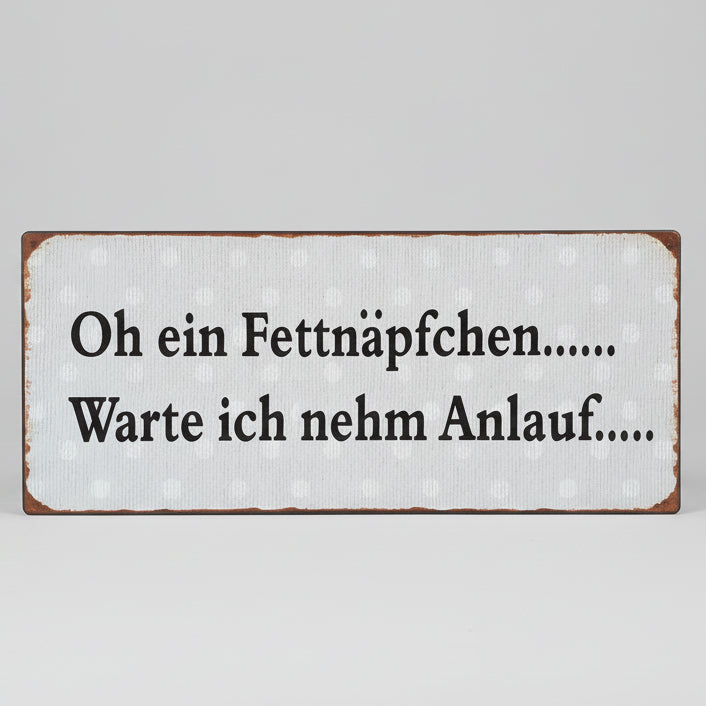 Metallschild "Oh ein Fettnäpfchen.. Warte ich nehm Anlauf"