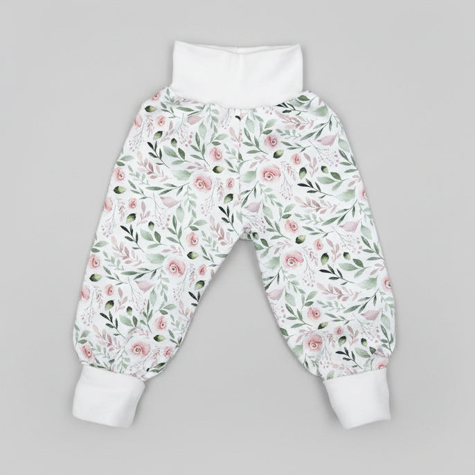 Babyhose aus Baumwolljersey mit Rosenmotiv in weiss und rosa, handgefertigt in der Schweiz, swiss made